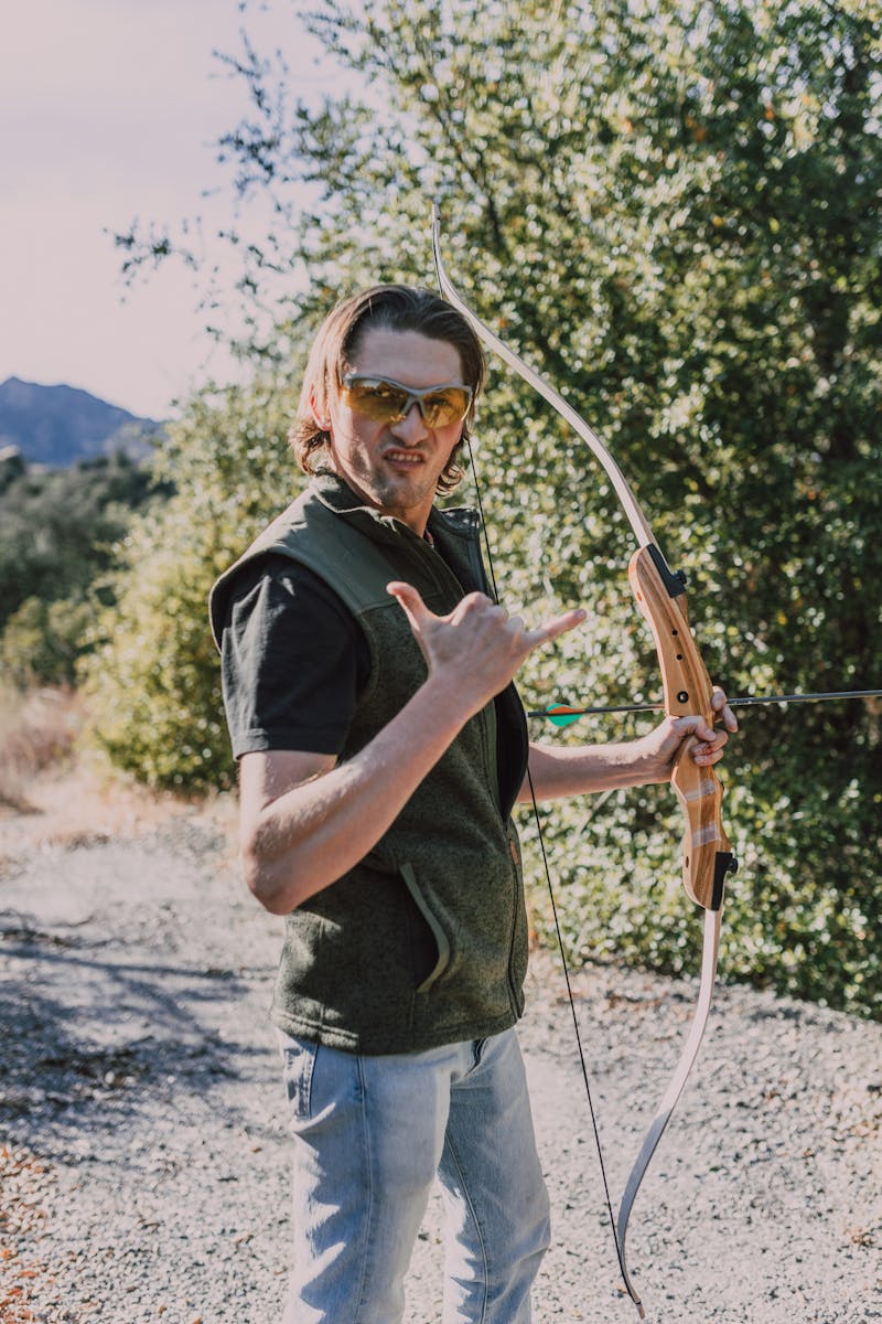 Archer checking arrow length