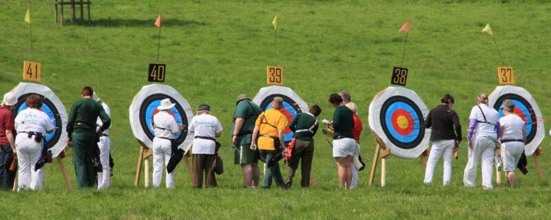 Archers scoring and collecting arrows at competition - Dunster Archery Somerset