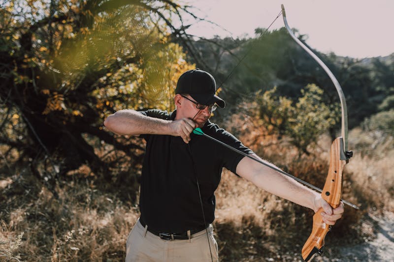 Archer wearing proper safety equipment