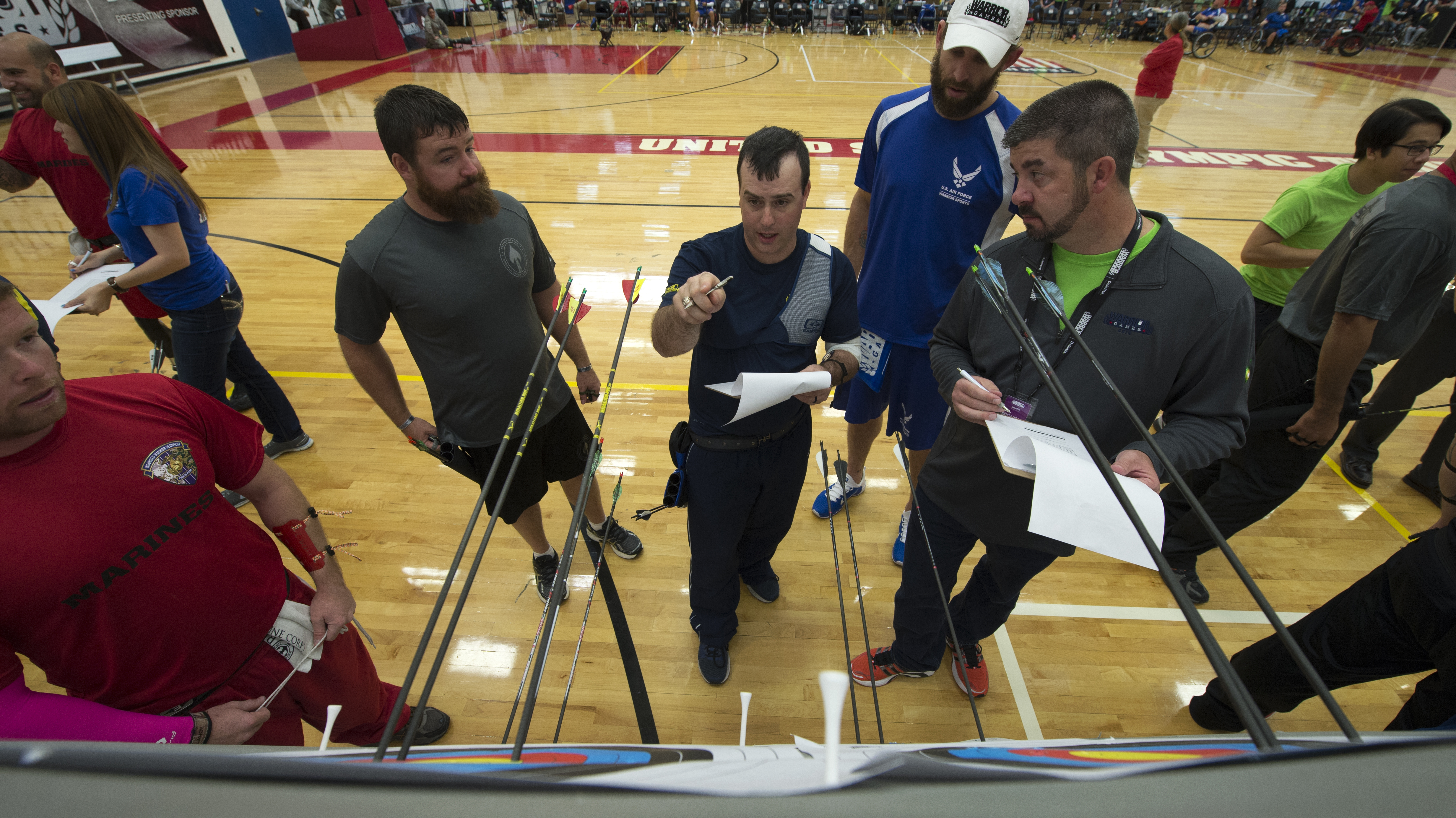 Colorful Olympic archery target showing gold, red, blue, black and white scoring rings