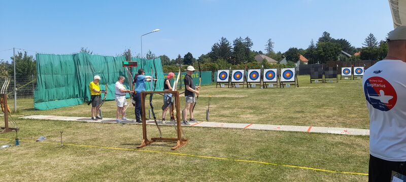 Archery competition with fletched arrows at tournament