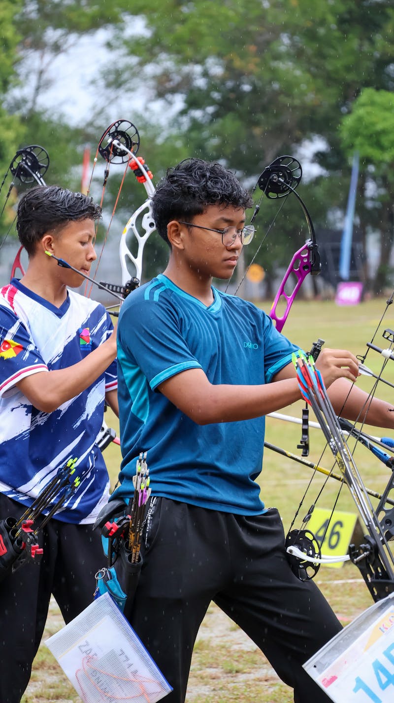 Young archers preparing for competition