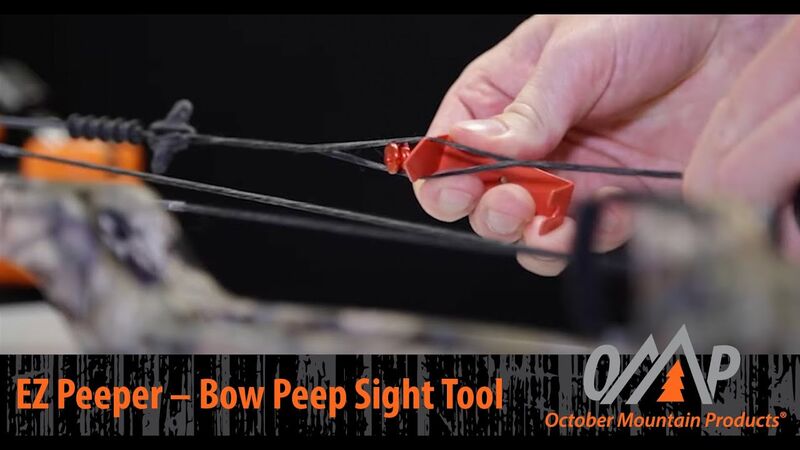 Complete compound bow archery setup with properly installed peep sight