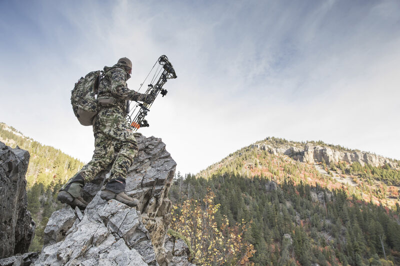 Bowhunter with compound bow using drop away arrow rest for accurate shot placement