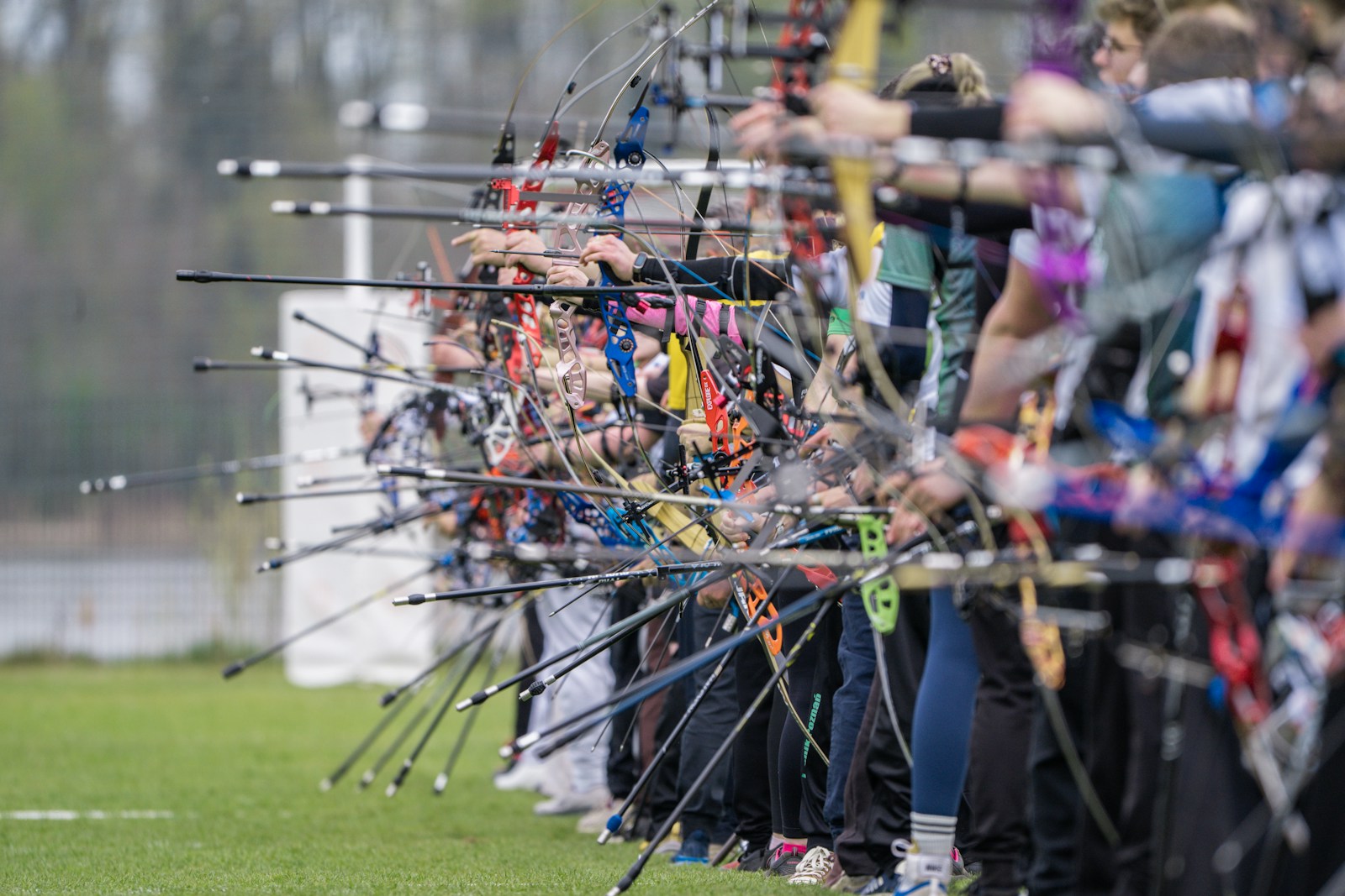 Compound archers shooting on a field representing Korea Asian Games compound team 2026