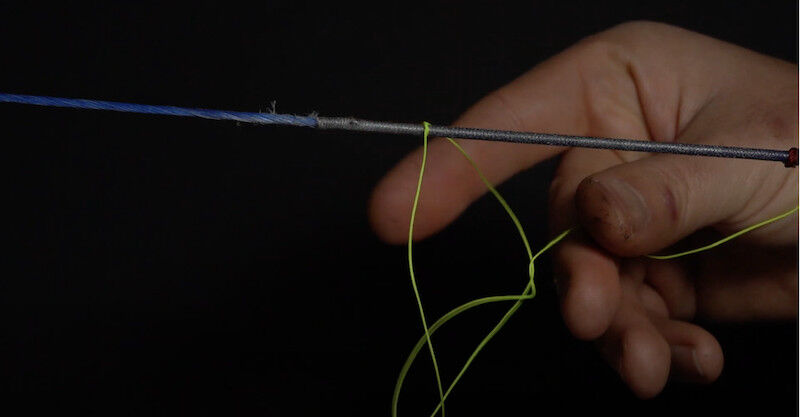 Archery nocking point step 2 serving material on bowstring