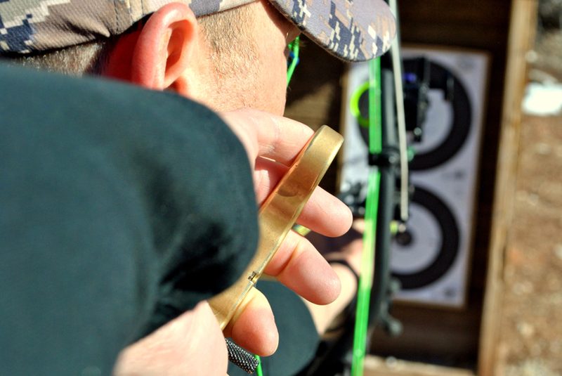 Aim hold and let down drill to retrain target panic archery response