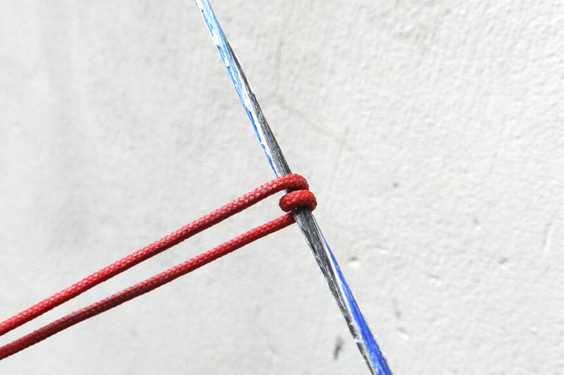 Paracord buffing a bowstring to delay replacement and restore performance