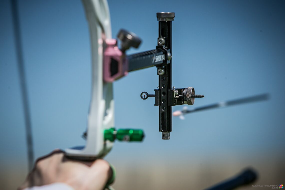 Compound bow sight aperture seen through the dominant eye sight picture