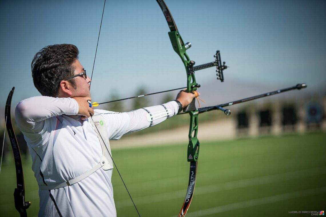 Korean recurve archer demonstrating clean dominant eye anchor and bow alignment