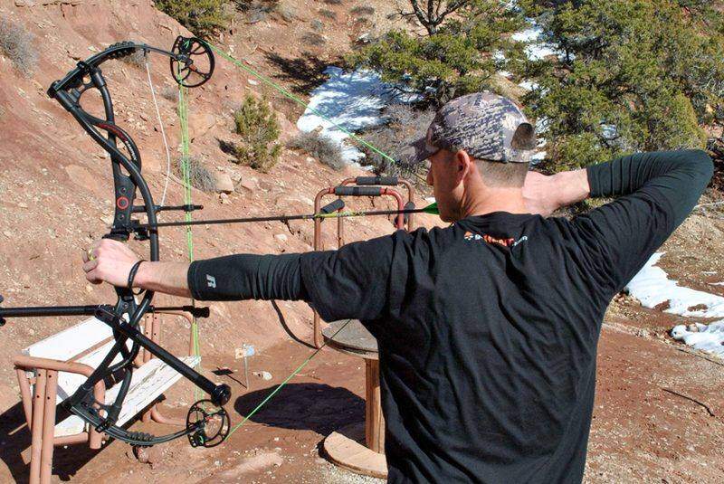 Archer at full draw battling target panic archery symptoms