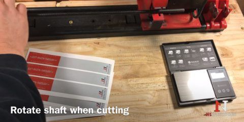 Arrow shaft cutter rotating the carbon shaft while cutting