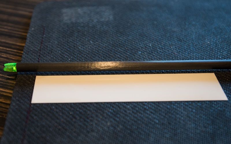 Hunting arrow shaft with vane length reference for helical fletching setup