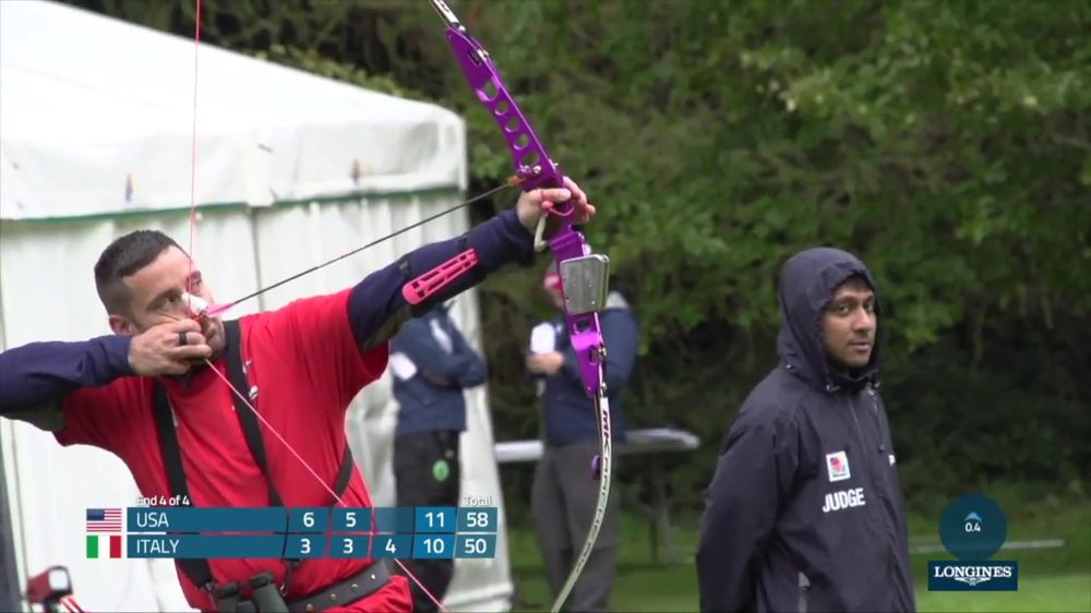 Barebow archer at full draw aiming without sights