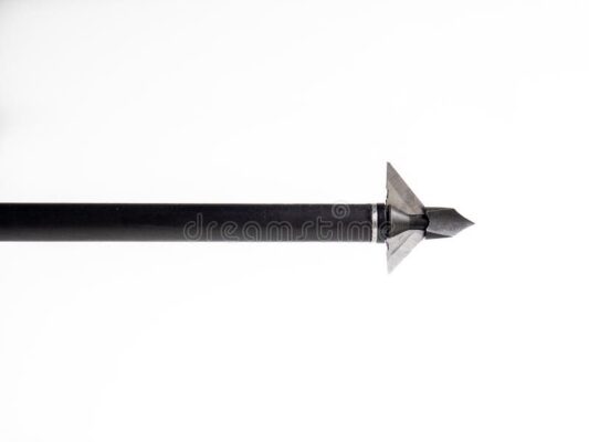 Broad-head arrow. A closeup of a broad-head arrow used for or bow hunting. two of the three points are visible. black shaft,