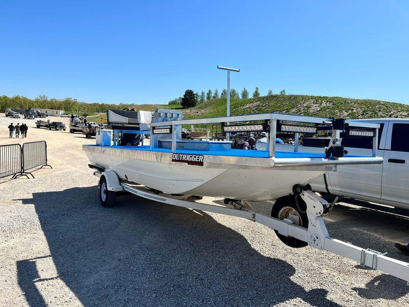 Bowfishing boat rigged with night lights for carp