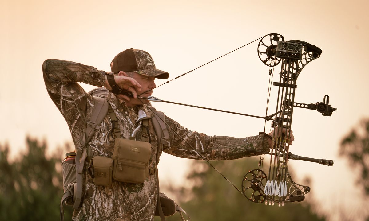 Bowhunter at full draw with a properly tuned compound bow