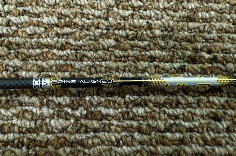 Carbon arrow spine and length markings on the shaft