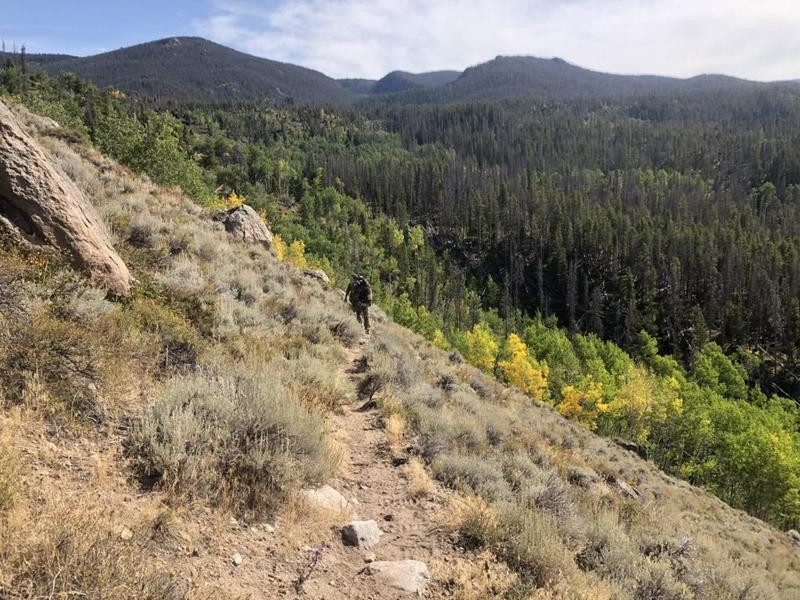 Backcountry bowhunter packing in on a DIY elk hunt