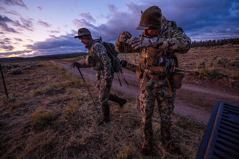 Bowhunter on a DIY elk hunt hiking off forest service access roads