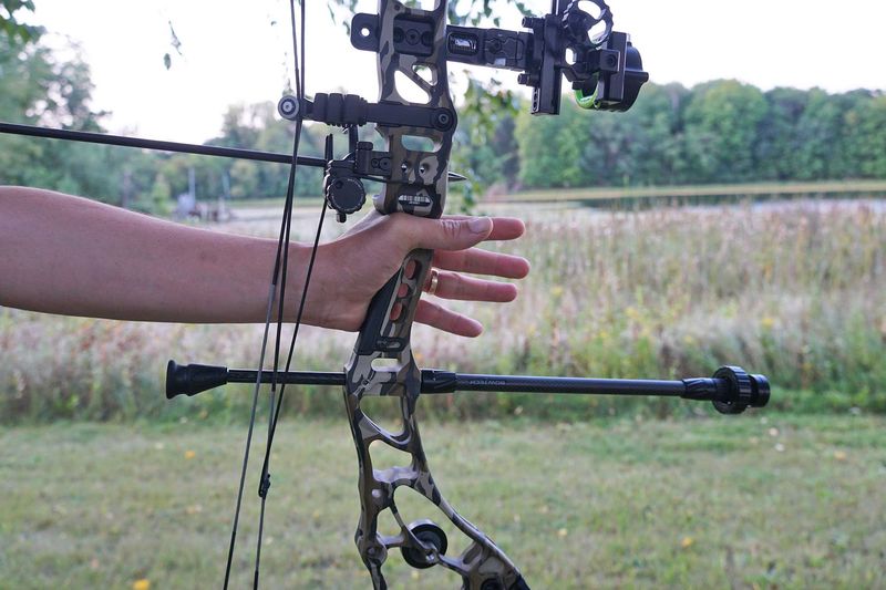 Extreme open bow hand grip with relaxed fingers and proper bow grip