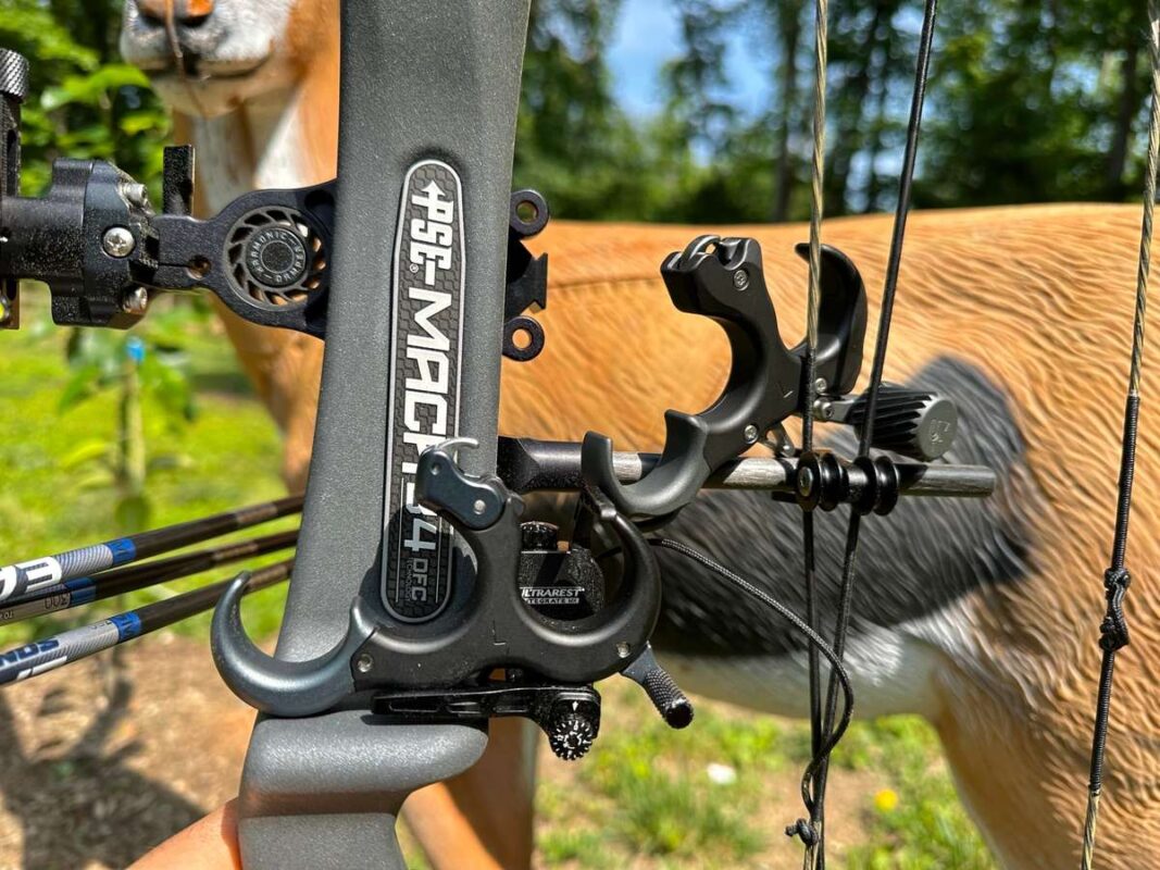 Compound bow release aid attached to a D-loop at full draw
