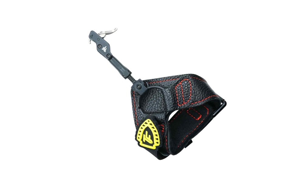 Index wrist strap archery release aid with trigger