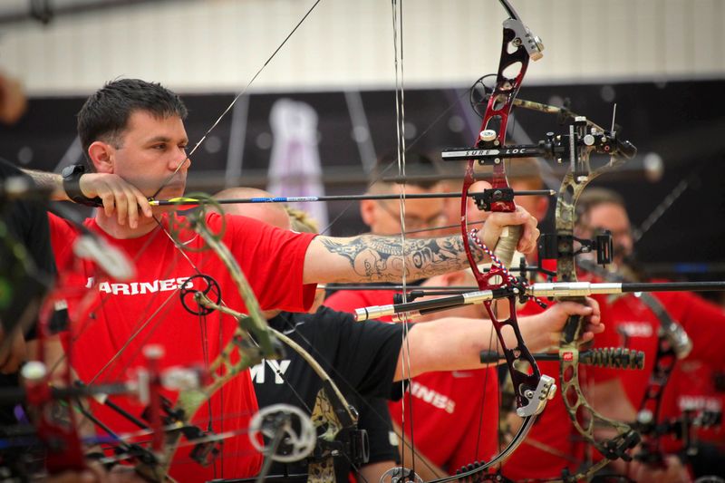 Archer at full draw with a modern compound bow showing the 2026 flagship cam design