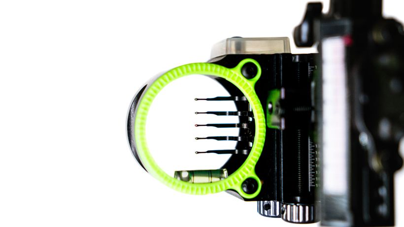 Multi pin bow sight close up showing five fiber optic pins