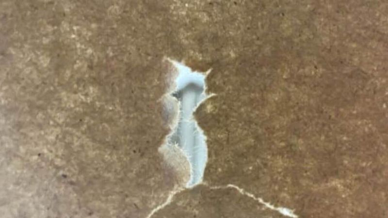 Nock low paper tear pattern shows arrow rest too high