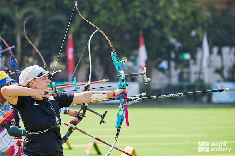 Olympic recurve bow with stabilizers at a World Archery competition