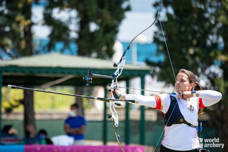 Archer at full draw with an Olympic recurve bow learning proper form