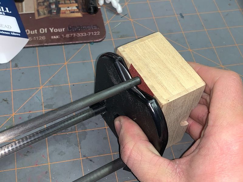 Spin test carbon arrow shaft on a roller for straightness
