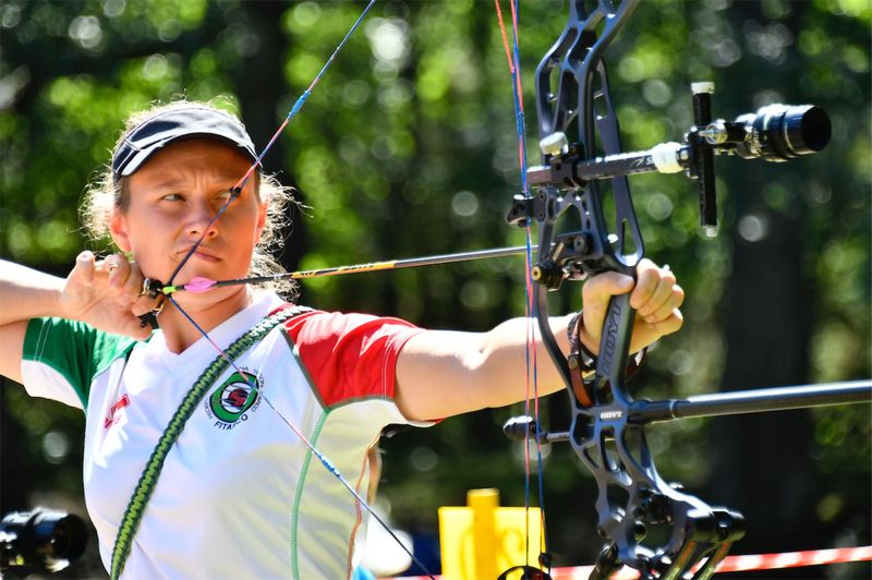 Compound bow archer at full draw during a World Archery 3D Championship event