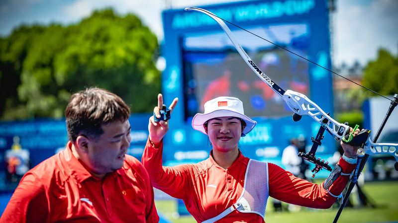 Zhu Jingyi celebrates second World Cup recurve women gold with her coach at Antalya 2026