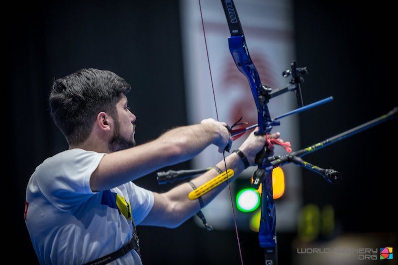 Archer at full draw before release, the position that sets up follow-through