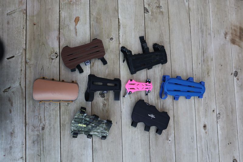 Archery arm guard types: leather, foam, plastic and nylon bracers compared