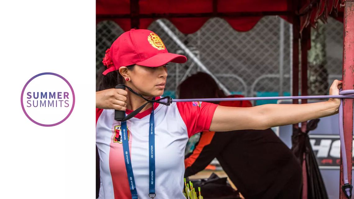Archer focusing on the mental game while aiming at the target