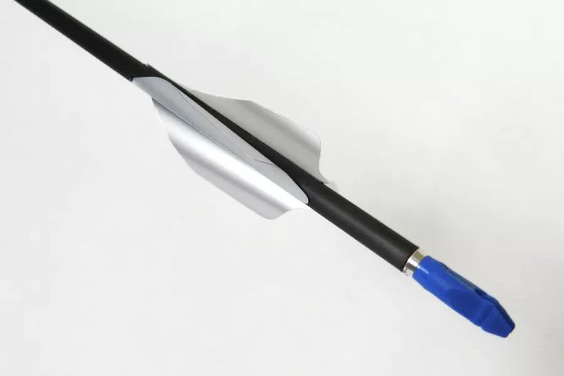 Arrow fletching vanes on a recurve bow arrow