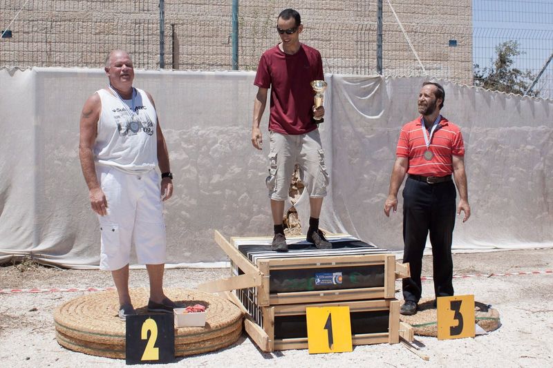 Barebow archers on the medal podium after a championship