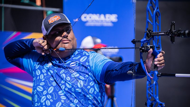 Compound archer competing at a Central American and Caribbean Games archery event