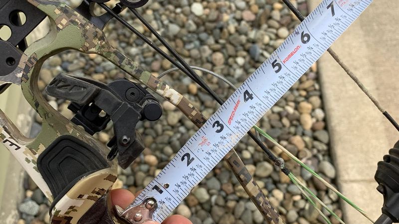 Measuring compound bow brace height with a tape measure