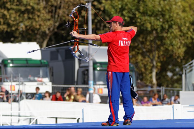 Compound bow archer at the release in target archery