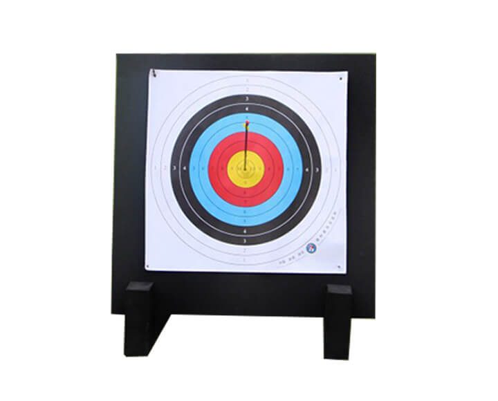 EVA foam archery target with paper face and an arrow embedded in the center