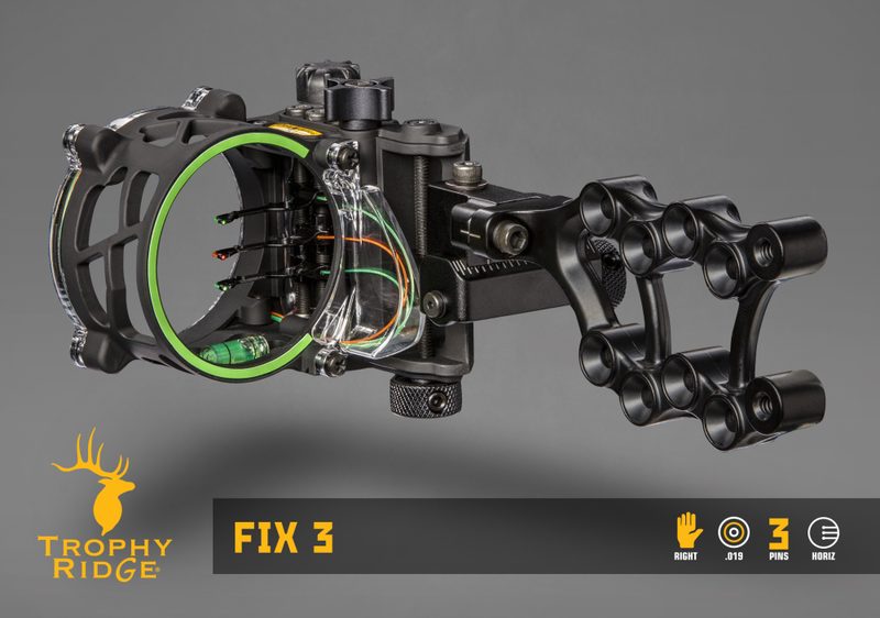 Fiber optic bow sight pins showing brightness on a three-pin hunting sight