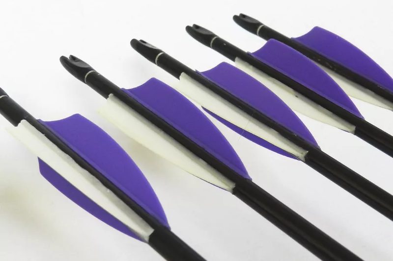 Finished fletched arrows with three plastic vanes