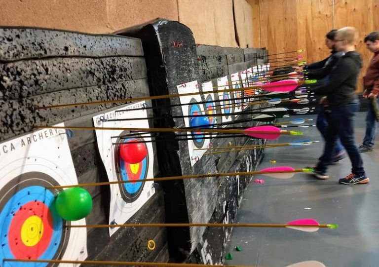 Indoor archery range with foam targets and arrows