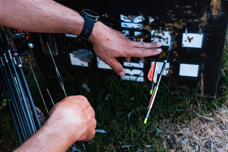 Reading bare shaft tuning results by comparing arrow impacts on the target