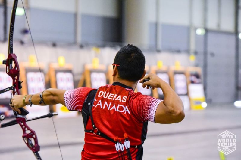 Recurve archer holding beginner draw weight at full draw with proper back tension