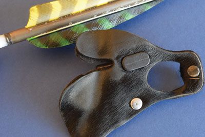 archery finger tab leather closeup showing construction and design